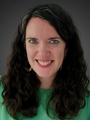 Headshot of Katie Appel, smiling